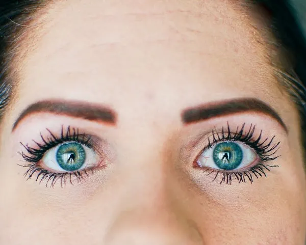 Woman shows off long eyelashes