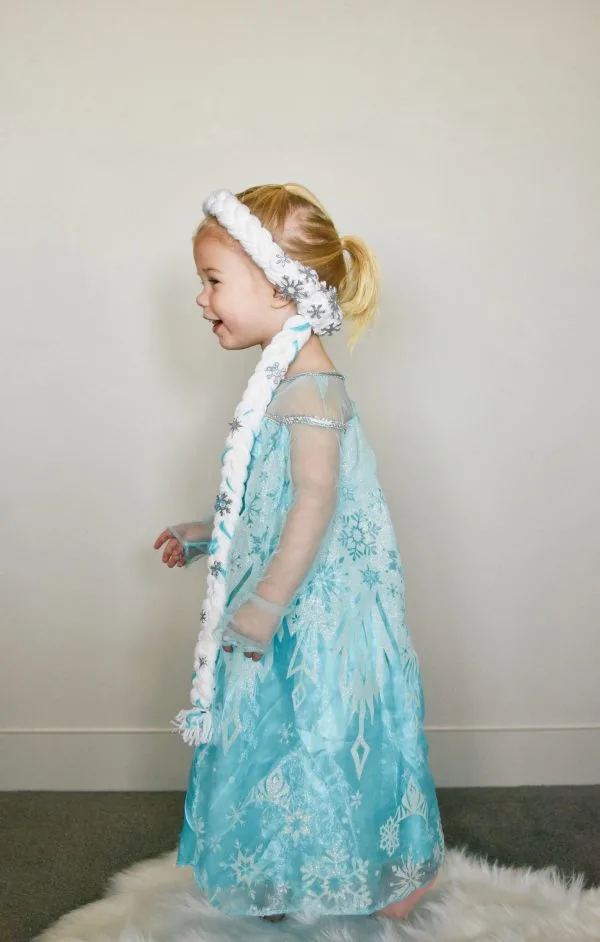 Toddler girl wearing an Elsa braid