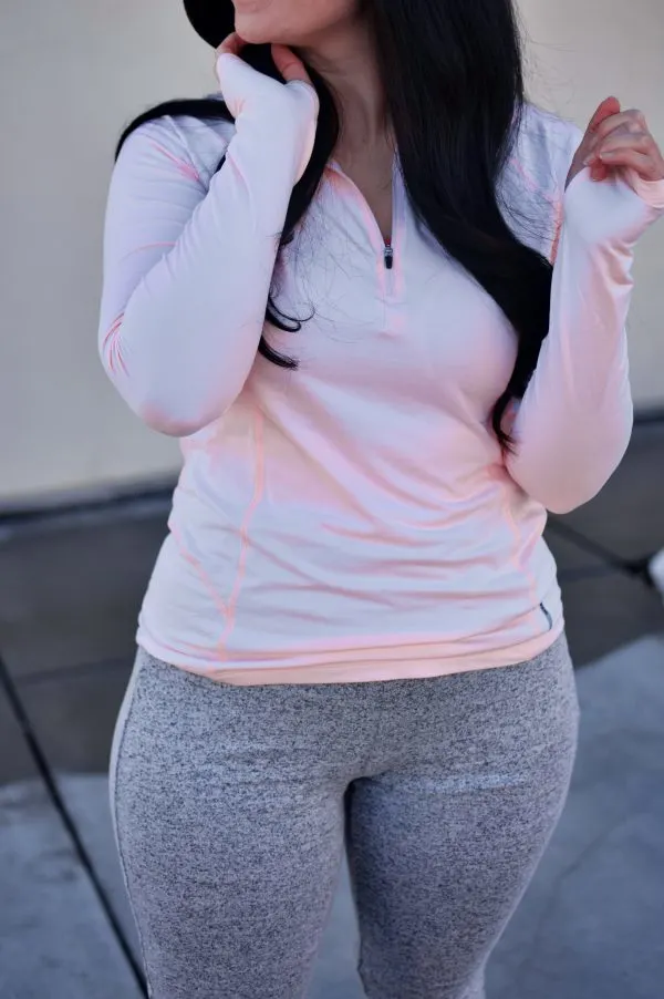 Woman shows off her athleisure clothing