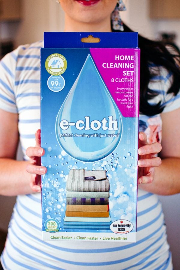 Mom holds e-cloth cleaning cloths.