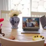 Boy watches Storyline Online on a laptop.