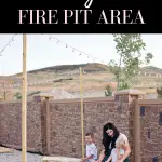Pinterest graphic with text that reads "How to Build a Backyard Fire Pit Area" and a mom with her kids sitting on a bench in a fire pit area.