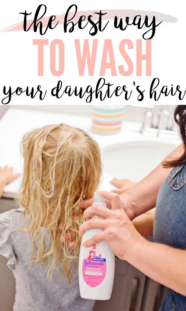 Pinterest graphic with text that reads "The Best Way to Wash Your Daughter's Hair" and a mom washing her daughter's hair outside of the tub.