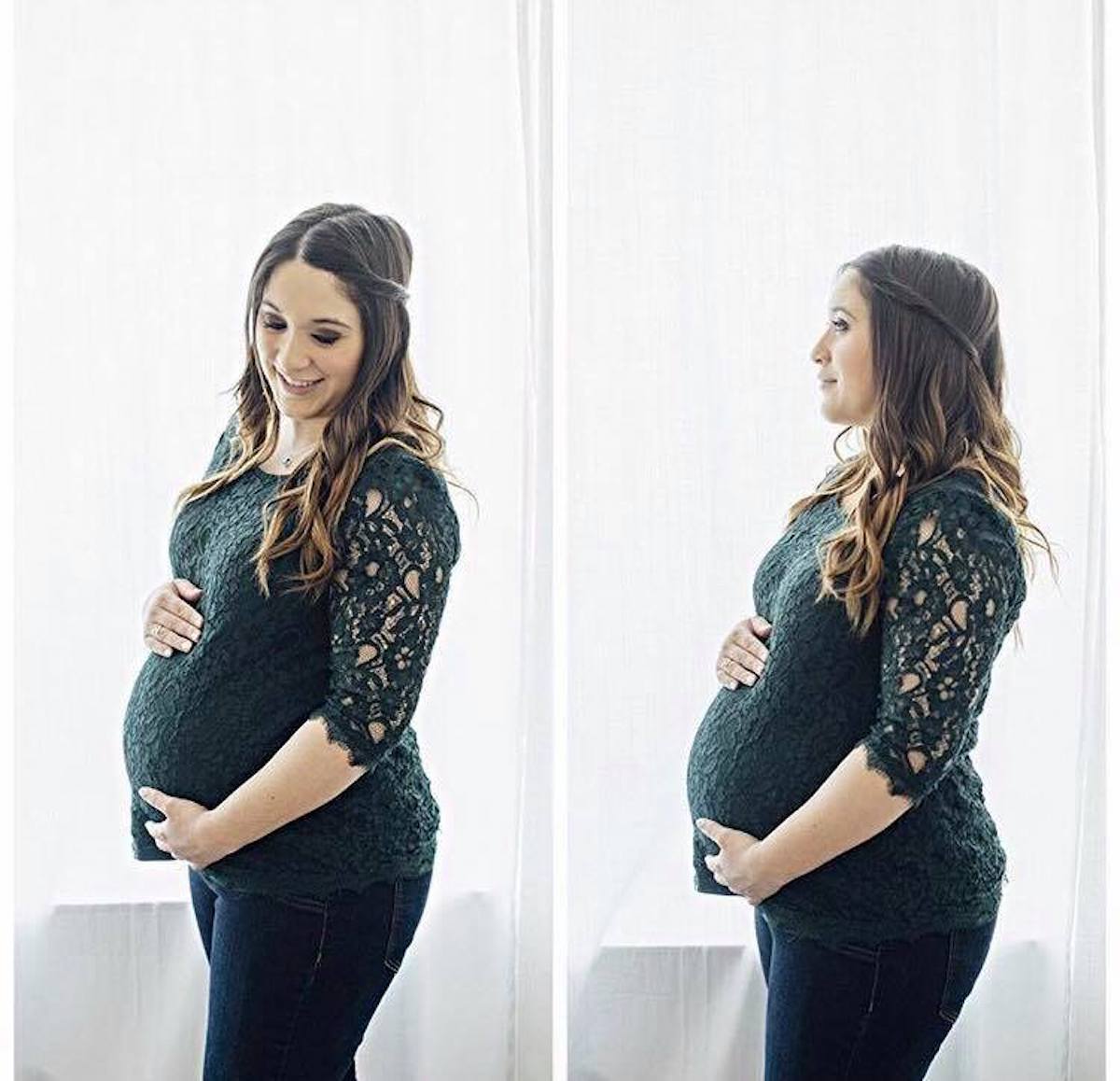 Woman wearing green lace top holds bump during studio maternity pictures.