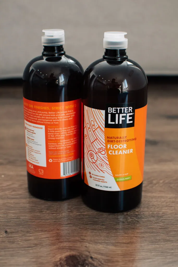 Two bottles of Better Life floor cleaner.
