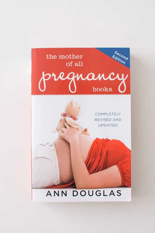 The Mother of all Pregnancy book on a table.