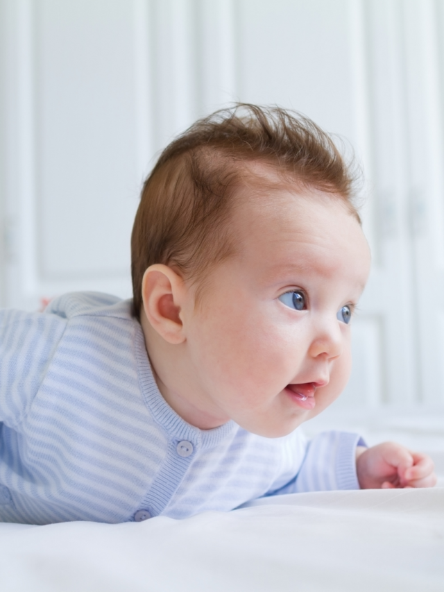 When do babies start holding their heads up?