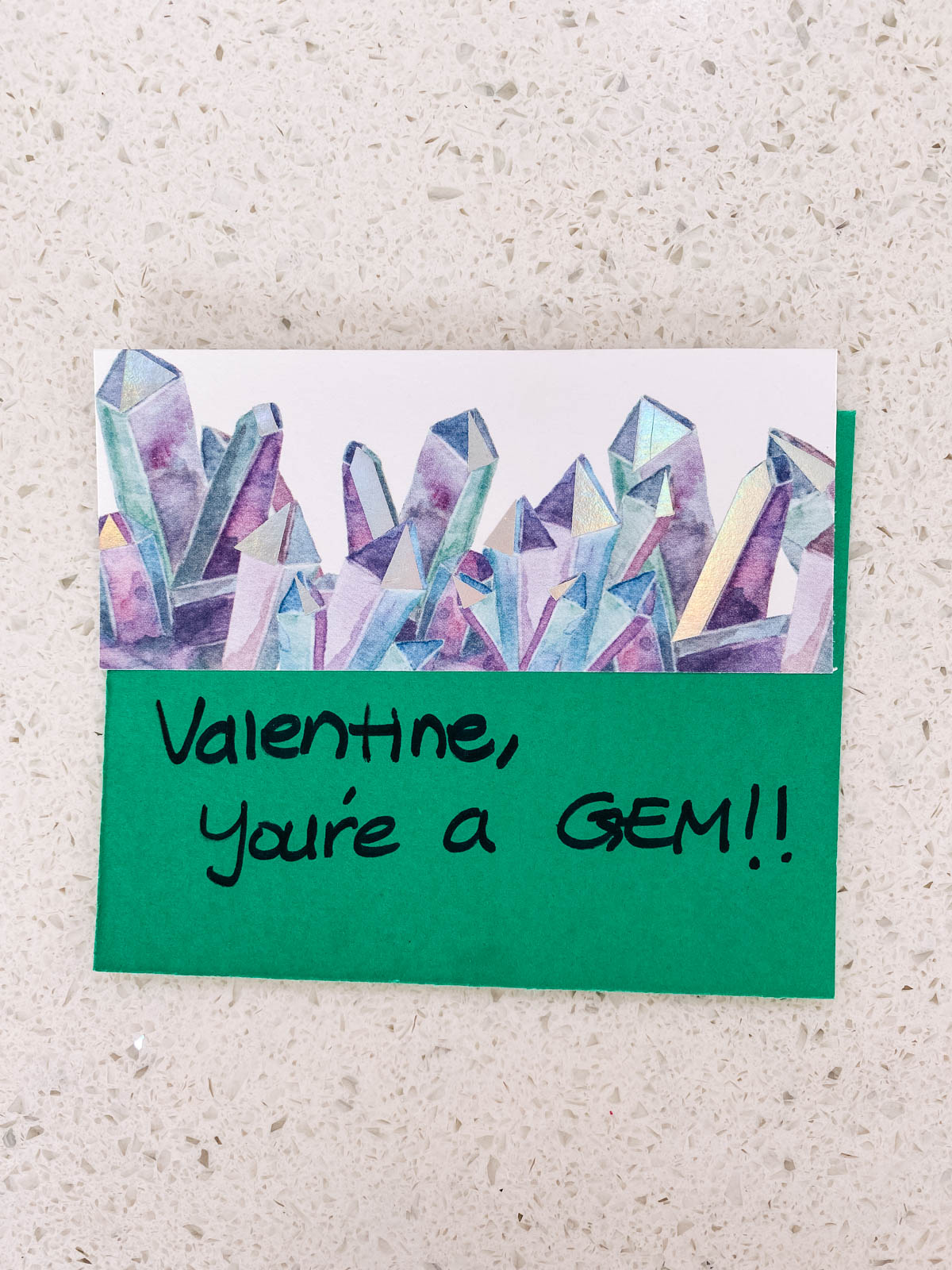 You're a gem Valentine's card and envelope on a kitchen counter.