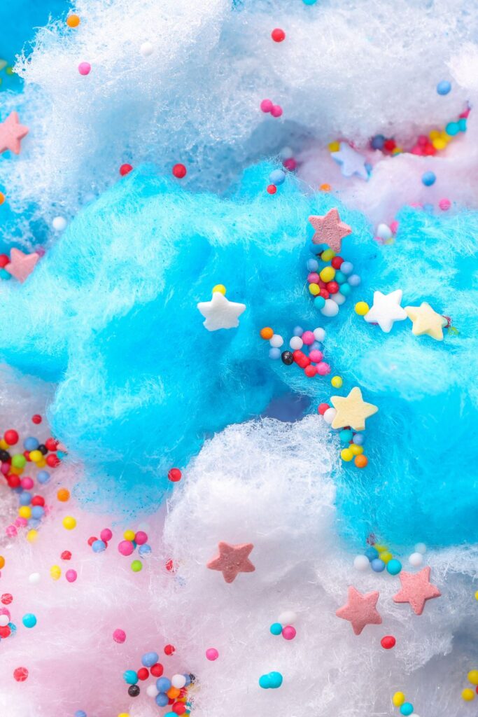 Pink and blue cotton candy with sprinkles.