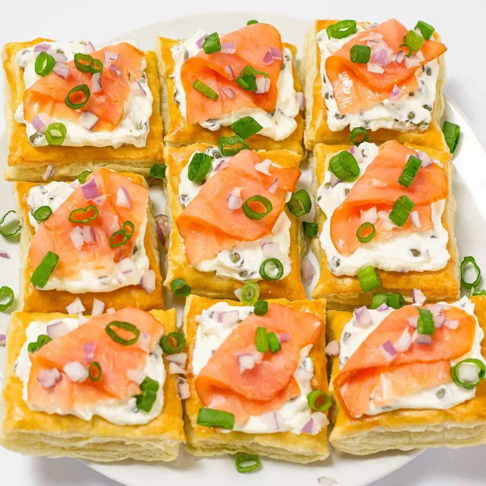 Cream cheese and lox puff pasty bites party appetizer.