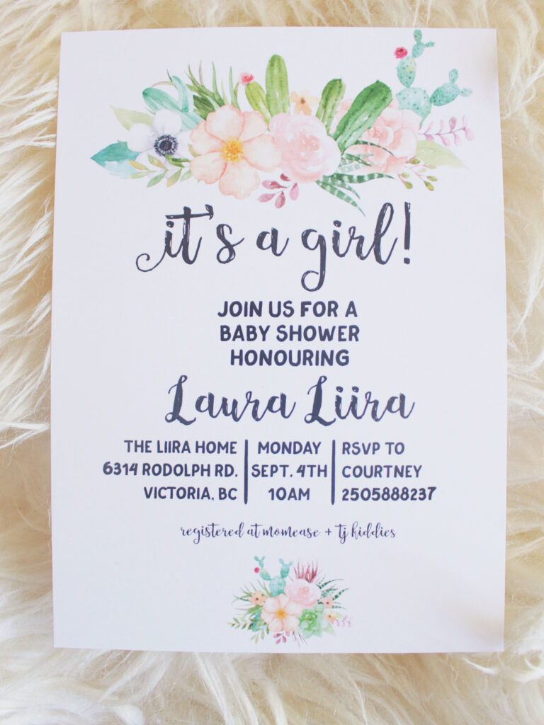 A baby shower invitation with flowers and cacti on it.